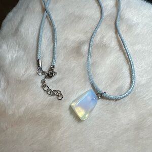 Healing Gem Stone with waxed-cotton gray rope 20” chain.